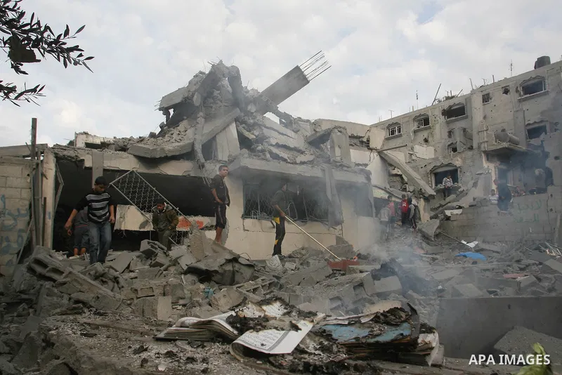 Palestinians inspect damaged tunnel following Israeli air strikes on the southern Gaza Strip town of Rafah on November 20, 2012. The Israeli military said it attacked about 100 targets in the coastal strip during the nig...