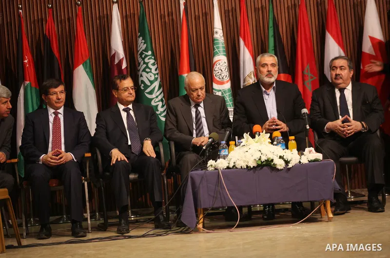 Arab League General Secretary Nabil al-Arabi and Turkish Foreign Minister Ahmet Davutoglu meet with Palestinian prime minister in Gaza Strip, Ismail Haniya in Gaza city, Tuesday, Nov. 20, 2012. Turkey's foreign minister...