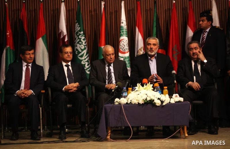 Arab League General Secretary Nabil al-Arabi and Turkish Foreign Minister Ahmet Davutoglu meet with Palestinian prime minister in Gaza Strip, Ismail Haniya in Gaza city, Tuesday, Nov. 20, 2012. Turkey's foreign minister...