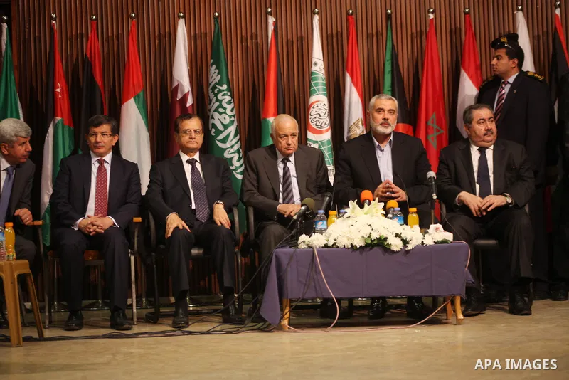 Arab League General Secretary Nabil al-Arabi and Turkish Foreign Minister Ahmet Davutoglu meet with Palestinian prime minister in Gaza Strip, Ismail Haniya in Gaza city, Tuesday, Nov. 20, 2012. Turkey's foreign minister...
