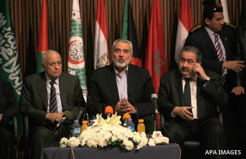 Arab League General Secretary Nabil al-Arabi and Turkish Foreign Minister Ahmet Davutoglu meet with Palestinian prime minister in Gaza Strip, Ismail Haniya in Gaza city, Tuesday, Nov. 20, 2012. Turkey's foreign minister...