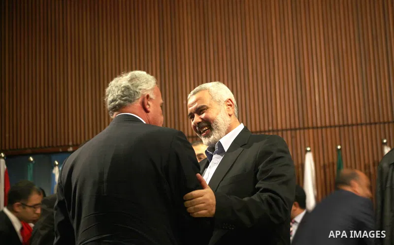 Arab League General Secretary Nabil al-Arabi and Turkish Foreign Minister Ahmet Davutoglu meet with Palestinian prime minister in Gaza Strip, Ismail Haniya in Gaza city, Tuesday, Nov. 20, 2012. Turkey's foreign minister...