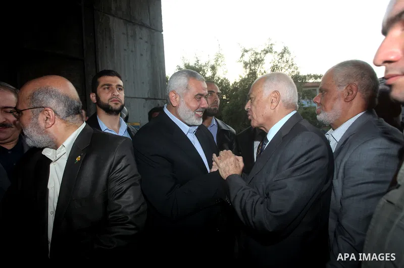 Arab League General Secretary Nabil al-Arabi and Turkish Foreign Minister Ahmet Davutoglu meet with Palestinian prime minister in Gaza Strip, Ismail Haniya in Gaza city, Tuesday, Nov. 20, 2012. Turkey's foreign minister...