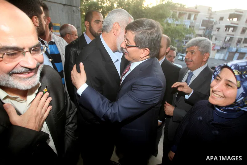 Arab League General Secretary Nabil al-Arabi and Turkish Foreign Minister Ahmet Davutoglu meet with Palestinian prime minister in Gaza Strip, Ismail Haniya in Gaza city, Tuesday, Nov. 20, 2012. Turkey's foreign minister...