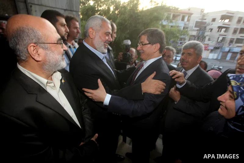 Arab League General Secretary Nabil al-Arabi and Turkish Foreign Minister Ahmet Davutoglu meet with Palestinian prime minister in Gaza Strip, Ismail Haniya in Gaza city, Tuesday, Nov. 20, 2012. Turkey's foreign minister...