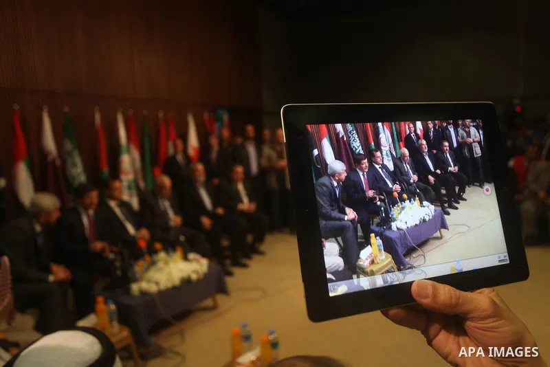 Arab League General Secretary Nabil al-Arabi and Turkish Foreign Minister Ahmet Davutoglu meet with Palestinian prime minister in Gaza Strip, Ismail Haniya in Gaza city, Tuesday, Nov. 20, 2012. Turkey's foreign minister...
