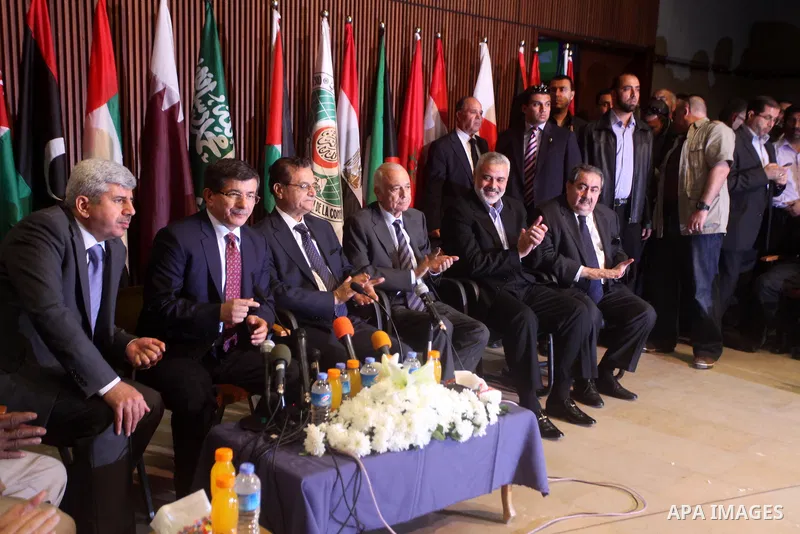 Arab League General Secretary Nabil al-Arabi and Turkish Foreign Minister Ahmet Davutoglu meet with Palestinian prime minister in Gaza Strip, Ismail Haniya in Gaza city, Tuesday, Nov. 20, 2012. Turkey's foreign minister...