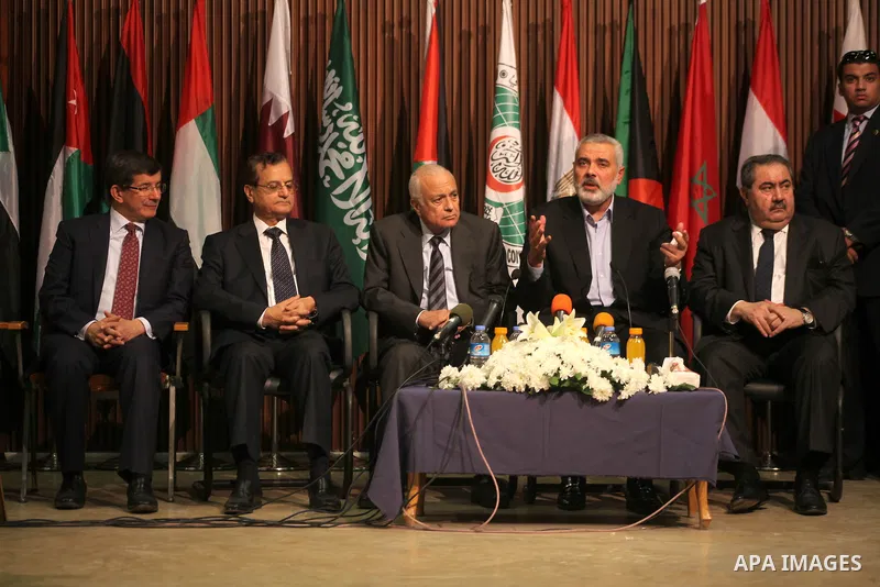 Arab League General Secretary Nabil al-Arabi and Turkish Foreign Minister Ahmet Davutoglu meet with Palestinian prime minister in Gaza Strip, Ismail Haniya in Gaza city, Tuesday, Nov. 20, 2012. Turkey's foreign minister...