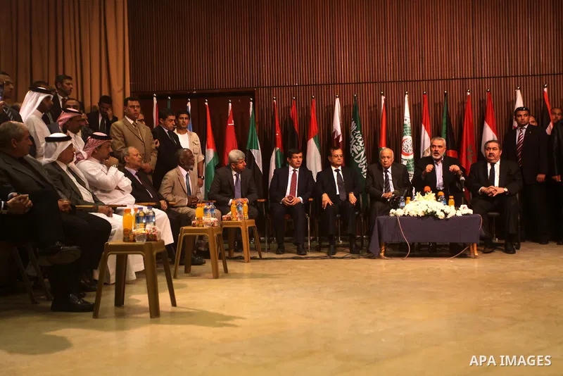 Arab League General Secretary Nabil al-Arabi and Turkish Foreign Minister Ahmet Davutoglu meet with Palestinian prime minister in Gaza Strip, Ismail Haniya in Gaza city, Tuesday, Nov. 20, 2012. Turkey's foreign minister...