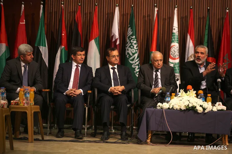 Arab League General Secretary Nabil al-Arabi and Turkish Foreign Minister Ahmet Davutoglu meet with Palestinian prime minister in Gaza Strip, Ismail Haniya in Gaza city, Tuesday, Nov. 20, 2012. Turkey's foreign minister...