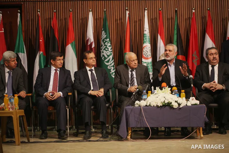 Arab League General Secretary Nabil al-Arabi and Turkish Foreign Minister Ahmet Davutoglu meet with Palestinian prime minister in Gaza Strip, Ismail Haniya in Gaza city, Tuesday, Nov. 20, 2012. Turkey's foreign minister...