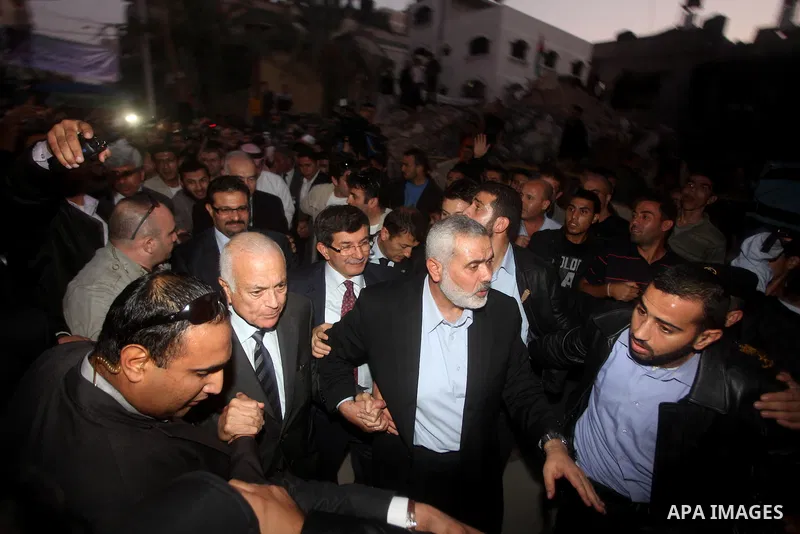 Arab League General Secretary Nabil al-Arabi and Turkish Foreign Minister Ahmet Davutoglu meet with Palestinian prime minister in Gaza Strip, Ismail Haniya in Gaza city, Tuesday, Nov. 20, 2012. Turkey's foreign minister...