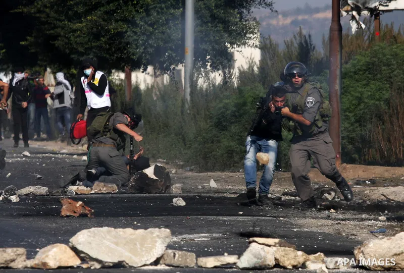 Israeli border guards arrest a Palestinian protester during clashes in the West Bank city of Nablus, on November 20, 2012. The West Bank has witnessed almost daily demonstrations in support of Gaza Palestinians who have...