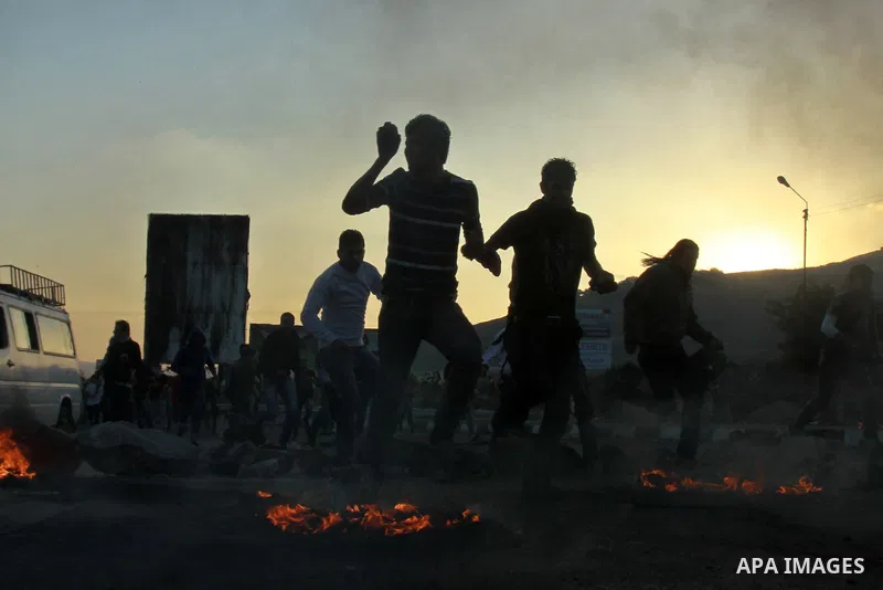 Palestinian protesters throw stones at Israeli soldiers during clashes in the West Bank city of Nablus, on November 20, 2012. The West Bank has witnessed almost daily demonstrations in support of Gaza Palestinians who ha...