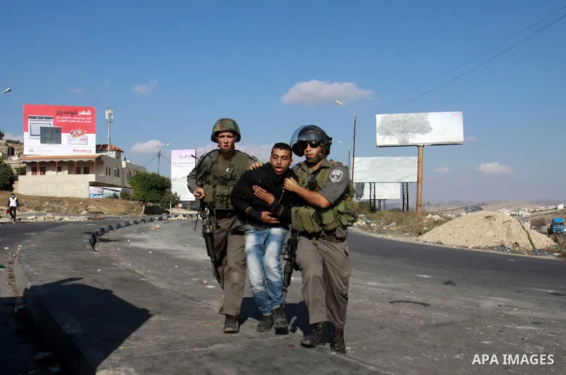 Israeli border guards arrest a Palestinian protester during clashes in the West Bank city of Nablus, on November 20, 2012. The West Bank has witnessed almost daily demonstrations in support of Gaza Palestinians who have...