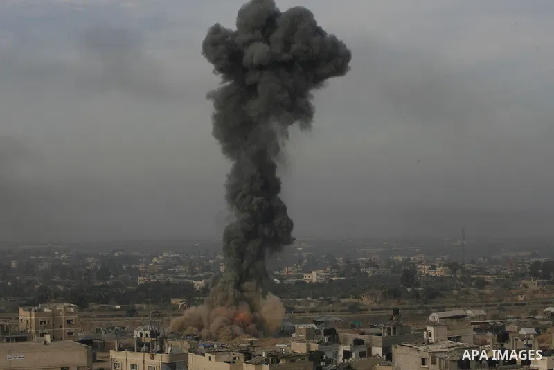 Smoke rises following an Israeli strike on smuggling tunnels along the border between Egypt and Rafah southern Gaza Strip, Wednesday, Nov. 21, 2012. Israeli aircraft pounded Gaza with at least 30 strikes overnight, hitti...