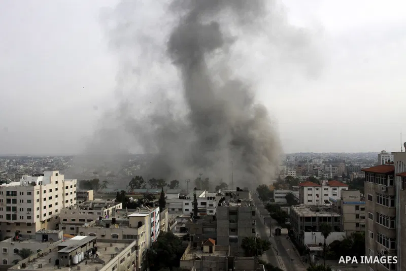 Smoke raises after an Israeli air strike in Gaza City, Wednesday, Nov. 21, 2012. Israeli aircraft pounded Gaza with at least 30 strikes overnight, hitting government ministries, smuggling tunnels, a banker's empty villa...