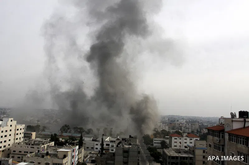 Smoke raises after an Israeli air strike in Gaza City, Wednesday, Nov. 21, 2012. Israeli aircraft pounded Gaza with at least 30 strikes overnight, hitting government ministries, smuggling tunnels, a banker's empty villa...