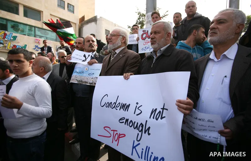 Aziz Dweik (C) Speaker of the Palestinian Legislative Council and a representative of the Hamas movment joins a protest against the Israeli targeting the Gazans media members, in the West Bank city of Hebron, November 21...