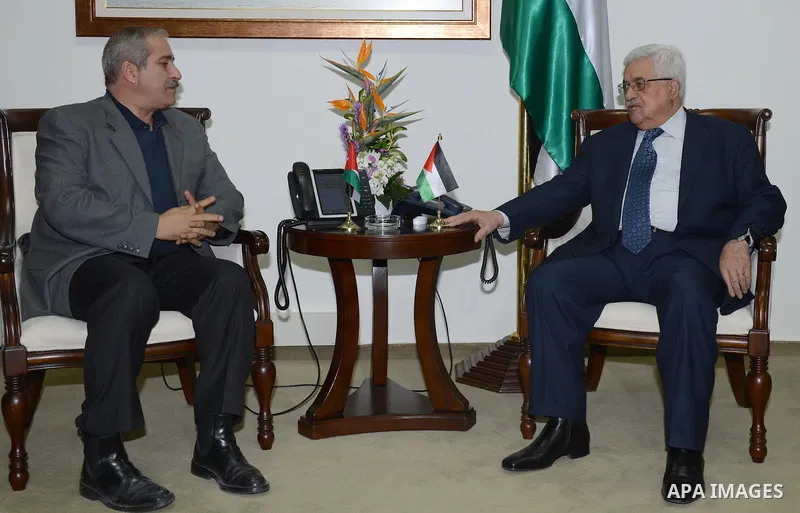 Palestinian President Mahmoud Abbas meets with Jordanian Foreign Minister Nasser Judeh in the West Bank city of Ramallah, Wednesday, Nov. 20, 2012. Photo by Thaer Ganaim