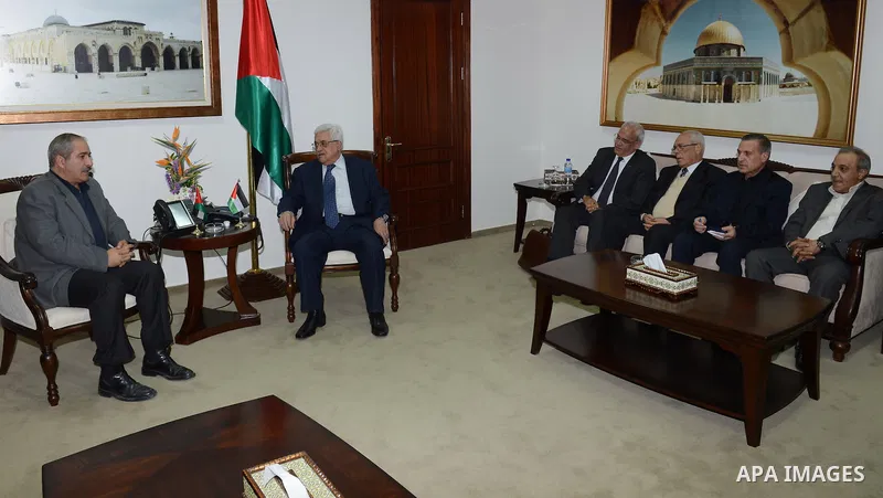 Palestinian President Mahmoud Abbas meets with Jordanian Foreign Minister Nasser Judeh in the West Bank city of Ramallah, Wednesday, Nov. 20, 2012. Photo by Thaer Ganaim