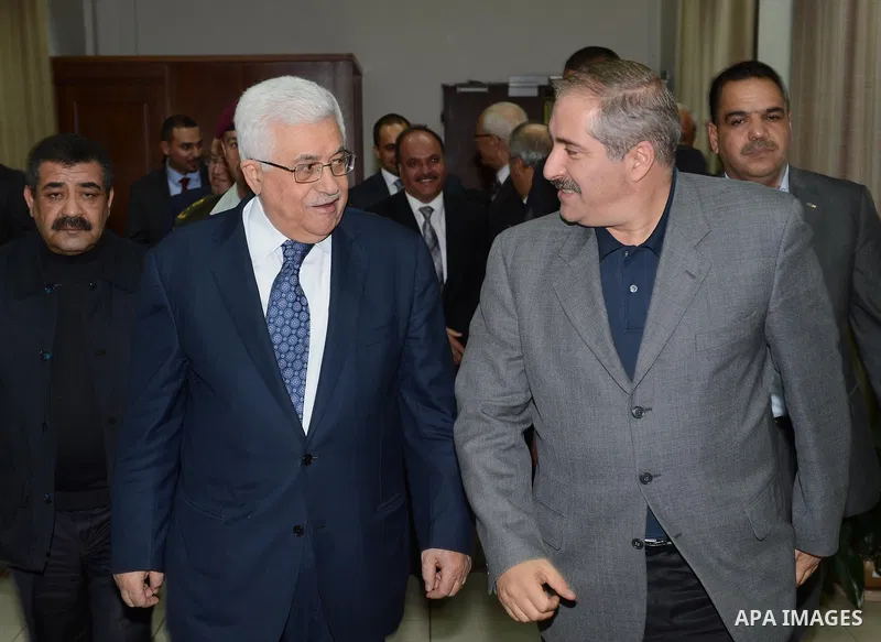 Palestinian President Mahmoud Abbas meets with Jordanian Foreign Minister Nasser Judeh in the West Bank city of Ramallah, Wednesday, Nov. 20, 2012. Photo by Thaer Ganaim