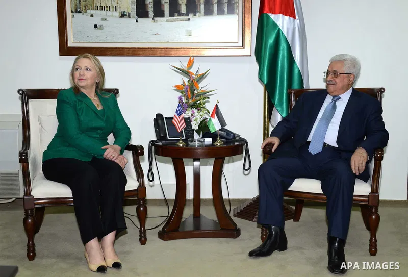 U.S. Secretary of State Hillary Rodham Clinton, meets with Palestinian President Mahmoud Abbas during a meeting in the West Bank city of Ramallah, Wednesday, Nov. 21, 2012. Clinton will try on Wednesday to wring an elusi...