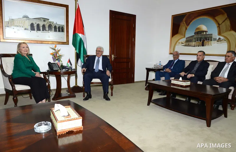 U.S. Secretary of State Hillary Rodham Clinton, meets with Palestinian President Mahmoud Abbas during a meeting in the West Bank city of Ramallah, Wednesday, Nov. 21, 2012. Clinton will try on Wednesday to wring an elusi...