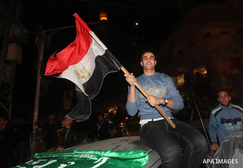 Palestinians celebrate what they say is a victory over Israel after an eight-day conflict in Gaza City, November 21, 2012. Israel and the Islamist Hamas movement agreed on Wednesday to an Egyptian-sponsored ceasefire to...