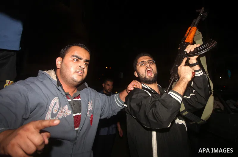 Palestinians celebrate what they say is a victory over Israel after an eight-day conflict in Gaza City, November 21, 2012. Israel and the Islamist Hamas movement agreed on Wednesday to an Egyptian-sponsored ceasefire to...
