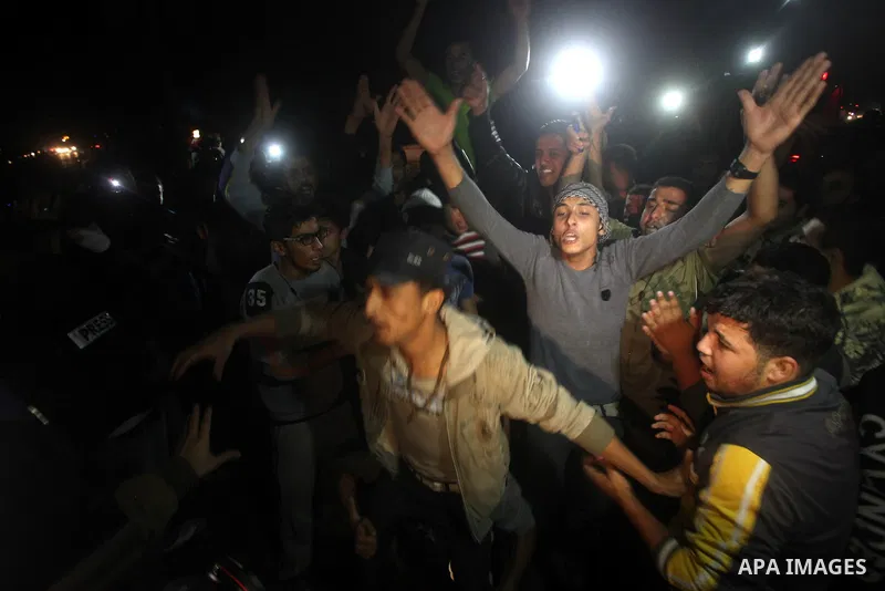 Palestinians celebrate what they say is a victory over Israel after an eight-day conflict in Gaza City, November 21, 2012. Israel and the Islamist Hamas movement agreed on Wednesday to an Egyptian-sponsored ceasefire to...