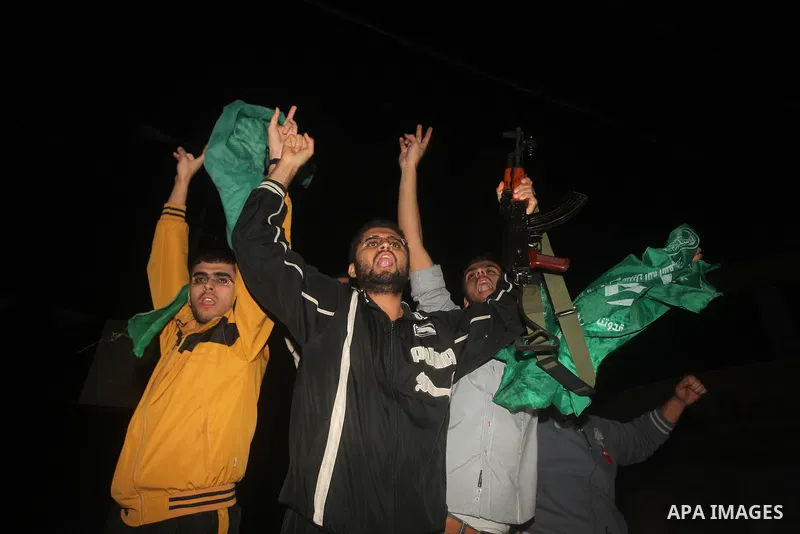 Palestinians celebrate what they say is a victory over Israel after an eight-day conflict in Gaza City, November 21, 2012. Israel and the Islamist Hamas movement agreed on Wednesday to an Egyptian-sponsored ceasefire to...