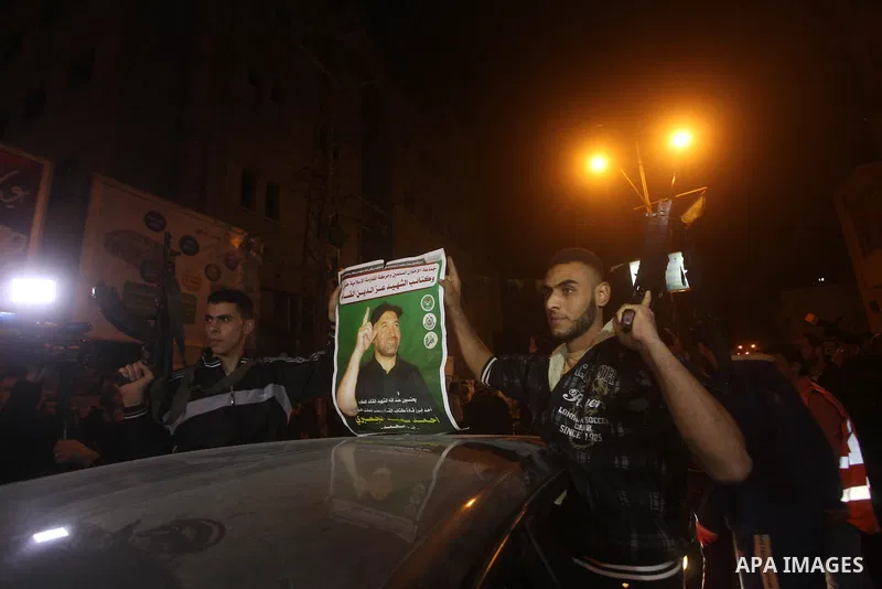 Palestinians celebrate what they say is a victory over Israel after an eight-day conflict in Gaza City, November 21, 2012. Israel and the Islamist Hamas movement agreed on Wednesday to an Egyptian-sponsored ceasefire to...