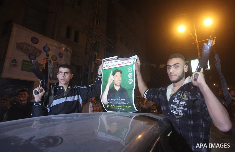 Palestinians celebrate what they say is a victory over Israel after an eight-day conflict in Gaza City, November 21, 2012. Israel and the Islamist Hamas movement agreed on Wednesday to an Egyptian-sponsored ceasefire to...