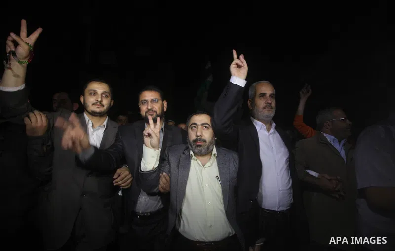 Hamas movement leaders celebrate what they say is a victory over Israel after an eight-day conflict in Gaza City November 21, 2012. Israel and the Islamist Hamas movement agreed on Wednesday to an Egyptian-sponsored ceas...