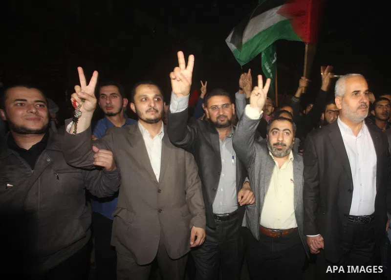 Hamas movement leaders celebrate what they say is a victory over Israel after an eight-day conflict in Gaza City November 21, 2012. Israel and the Islamist Hamas movement agreed on Wednesday to an Egyptian-sponsored ceas...