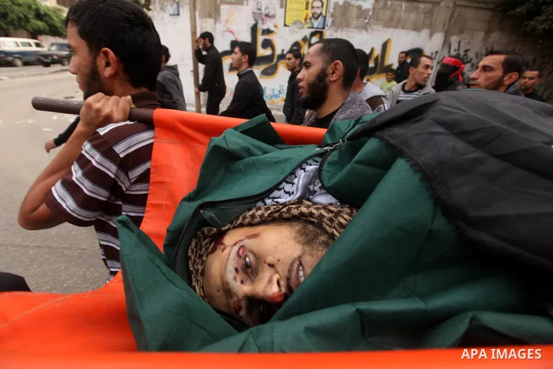 Palestinian militants from the Popular Front for the Liberation of Palestine (PFLP) attends the funeral of Mohammed Abdel-Rahman Ayesh, a militant from from the Al Nasser Brigades, an armed wing of the Popular Resistance...