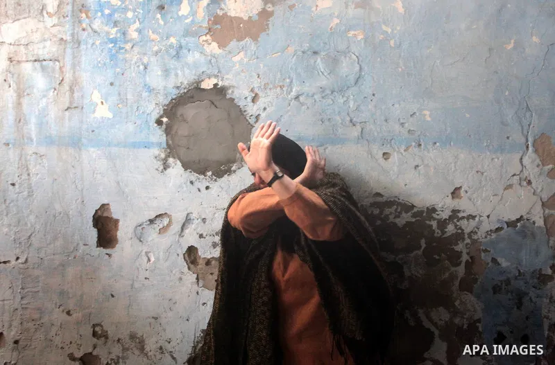 Relatives of three-year-old Reham Al Nabaheen mourn during her funeral in Al Nusairat refugee camp in the central Gaza Strip, 22 November 2012. Reham Al Nabaheen was reportedly killed after an Israeli air strike on Al Bu...