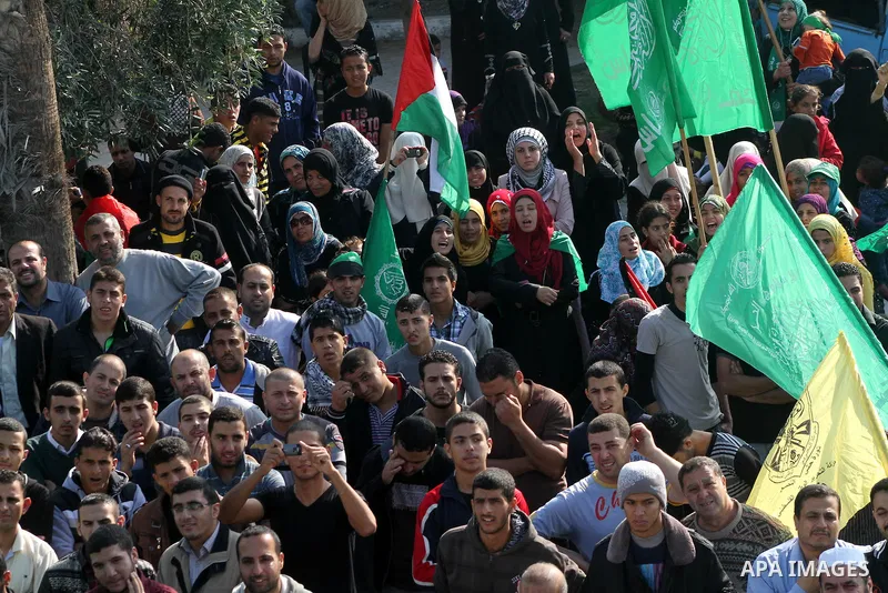 Palestinians gather to celebrate and listen to Palestinian prime minister in the Gaza Strip Ismail Haniya delivering a speech in Gaza City on November 22, 2012. The ruling Hamas movement declared the day to be a public h...