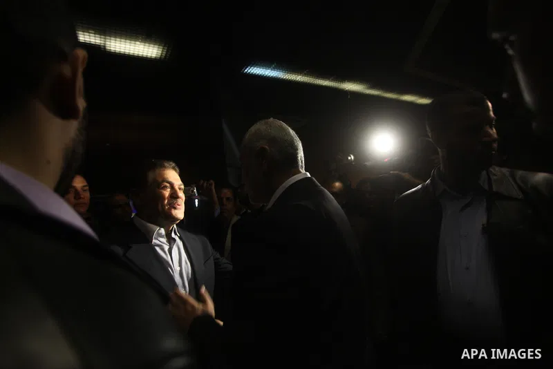 Palestinian prime minister in Gaza, Ismail Haniya with fellow Hamas members after delivering a speech in Gaza City on November 22, 2012. The ruling Hamas movement declared the day to be a public holiday to mark the end o...