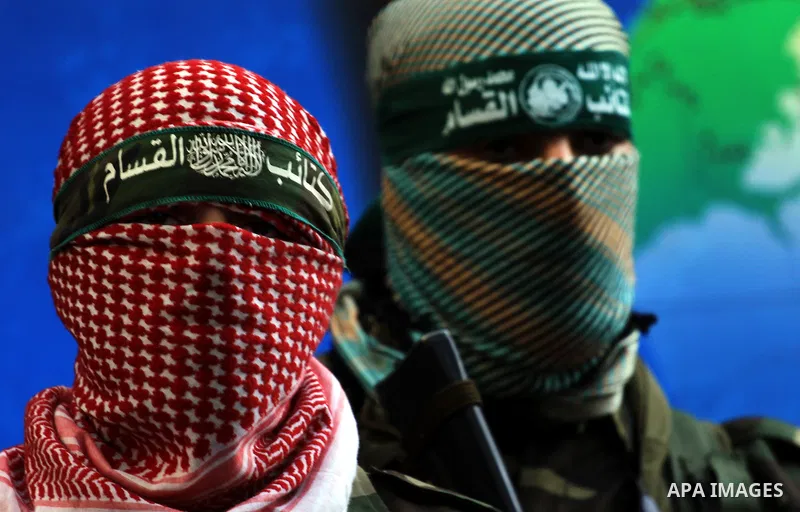 Abu Obaida , the spokesman for the Ezzedine Al-Qassam Brigades, the armed wing of Hamas, speaks during a news conference in Gaza City on November 22, 2012 at the house of their late leader Ahmed Jaabari, who was killed w...