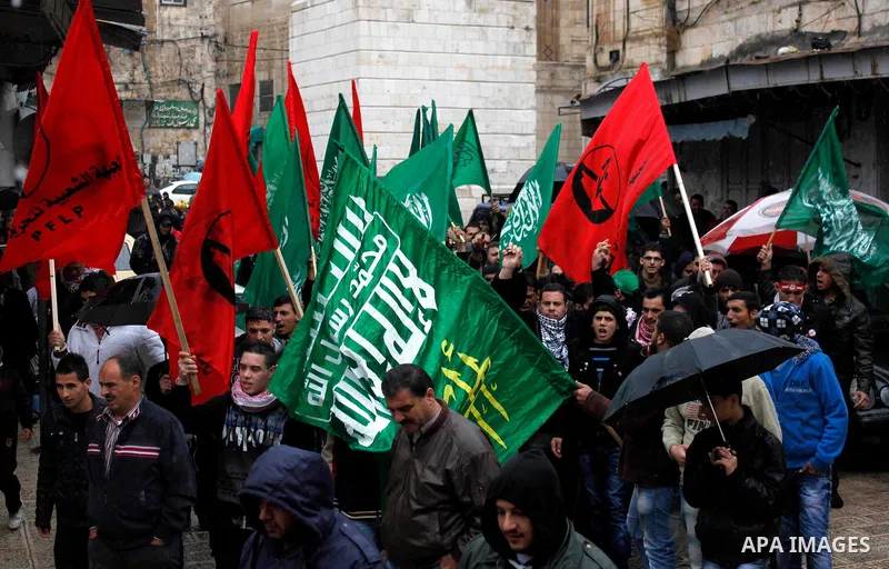 Palestinian supporters of the Islamist movement Hamas shout slogans during a demonstration in the West Bank city of Nablus 23 November 2012 to show solidarity with Palestinians in the Gaza Strip. Photo by Nedal Eshtayah