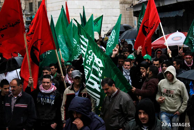 Palestinian supporters of the Islamist movement Hamas shout slogans during a demonstration in the West Bank city of Nablus 23 November 2012 to show solidarity with Palestinians in the Gaza Strip. Photo by Nedal Eshtayah