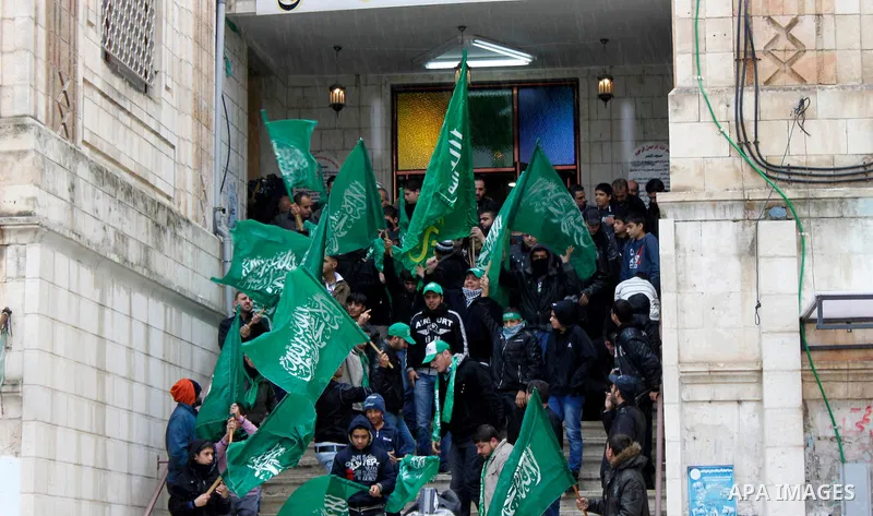 Palestinian supporters of the Islamist movement Hamas shout slogans during a demonstration in the West Bank city of Nablus 23 November 2012 to show solidarity with Palestinians in the Gaza Strip. Photo by Nedal Eshtayah