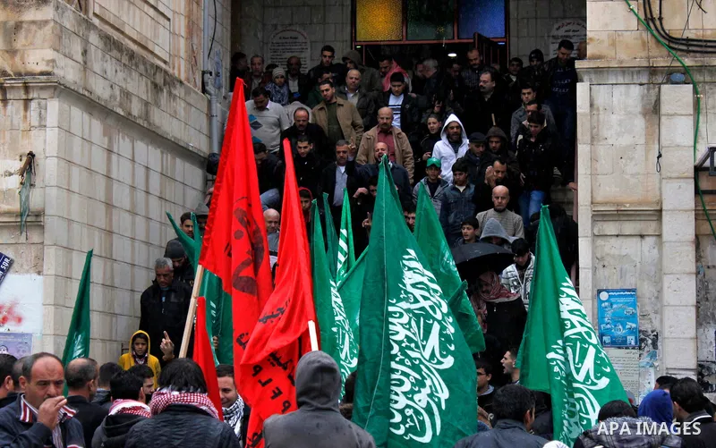 Palestinian supporters of the Islamist movement Hamas shout slogans during a demonstration in the West Bank city of Nablus 23 November 2012 to show solidarity with Palestinians in the Gaza Strip. Photo by Nedal Eshtayah