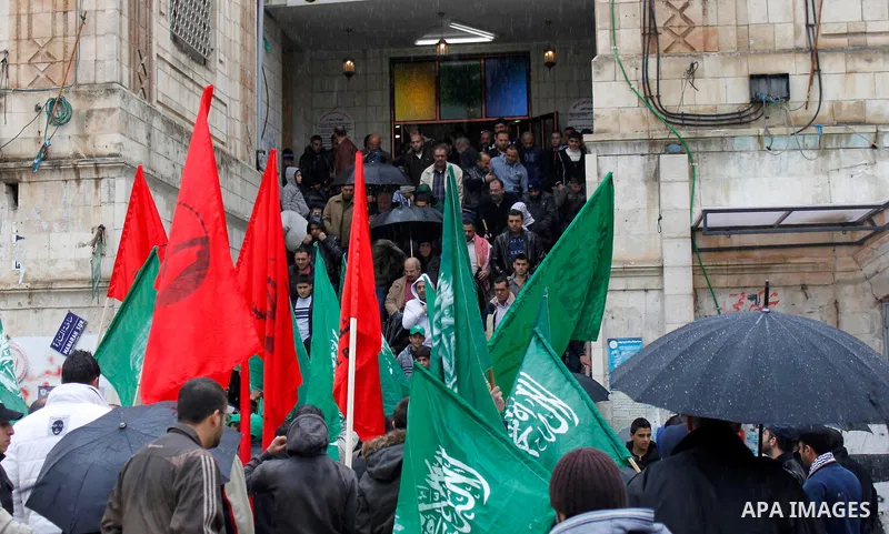 Palestinian supporters of the Islamist movement Hamas shout slogans during a demonstration in the West Bank city of Nablus 23 November 2012 to show solidarity with Palestinians in the Gaza Strip. Photo by Nedal Eshtayah