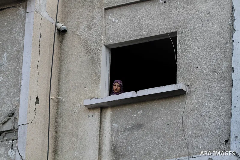 Palestinian Family members inspect thier house destroyed during a recent Israeli airstrike in Gaza City, 23 November 2012. Palestinians and Israelis on both sides of the Gaza border tried to resume everyday life after a...