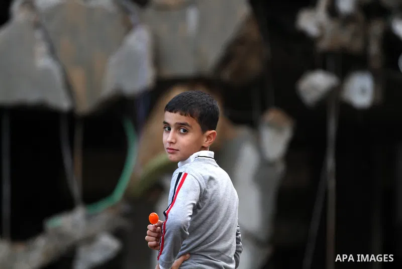 Palestinian Family members inspect thier house destroyed during a recent Israeli airstrike in Gaza City, 23 November 2012. Palestinians and Israelis on both sides of the Gaza border tried to resume everyday life after a...