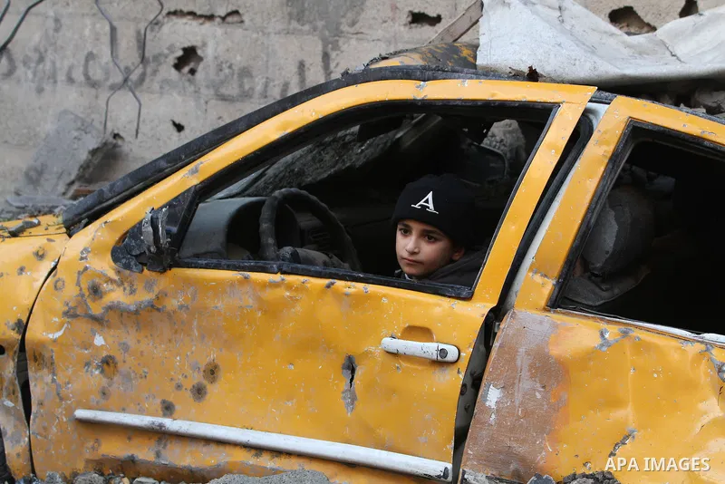 Palestinian Family members inspect thier house destroyed during a recent Israeli airstrike in Gaza City, 23 November 2012. Palestinians and Israelis on both sides of the Gaza border tried to resume everyday life after a...