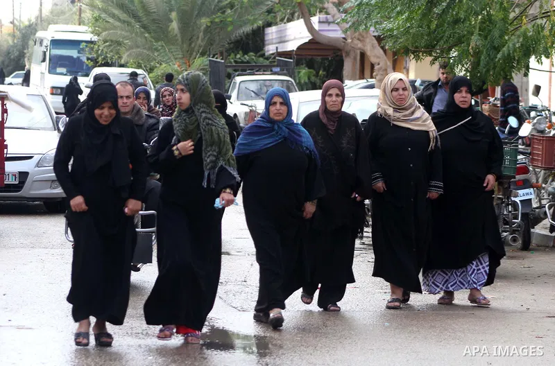 Palestinian women mourn during the funeral of Anwar Qudih, 20, in Khan Younis, southern Gaza Strip, Nov. 23, 2012. Israeli troops at the Gaza border shot dead Qudeh and wounded 15 more on Friday, health officials said, i...